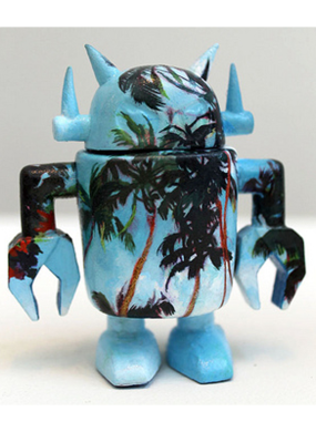 Sky blue and white robot looking figure with palm trees painted